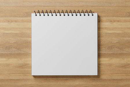 mockup blank white notepad or calendar on wooden table. inspiration, memory, rustic, business, planning concept. top view. copy spaceの写真素材
