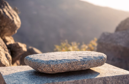 Product Presentation on Stone Pedestal Outdoors, Ideal for Highlighting Goods Against Nature Background with Mountains, Perfect for Advertisement and Commercial Displayの素材