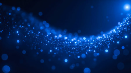 Sparkling blue bokeh lights on gradient background, abstract twinkling light particles, festive shimmering backdrop for holiday designs, serene and magical atmosphereの写真素材