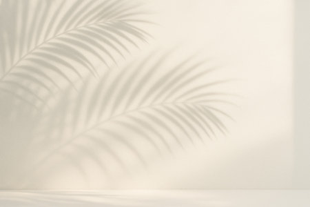 Delicate silhouette palm leaves. frond pattern dances across sunlit surface offering natural minimalist scene ideal marketing mockup template cosmetic packagingの写真素材