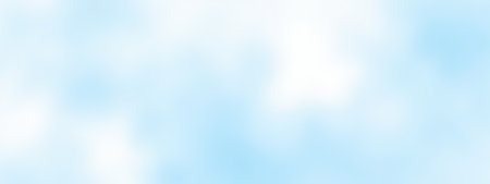 Bright smooth blue sky with blurry clouds, simple background, soft color gradient, clean peaceful air, perfect for banner, website, advertising, graphic designの写真素材