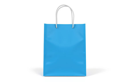 Minimalistic blue gift bag with empty surface and simple rope handles, perfect for product branding, shop packaging, retail presentation, online store mockup, advertising, sale, commercial promoの写真素材
