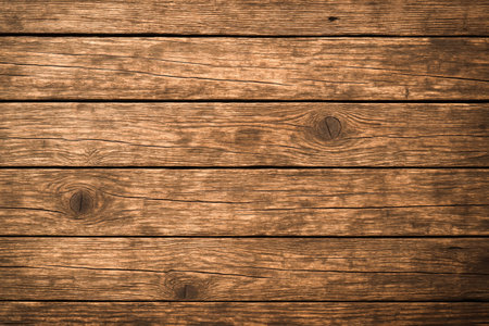 High resolution weathered wood board texture, horizontal brown planks for use in rustic wall designs, natural background for text or product presentationの写真素材
