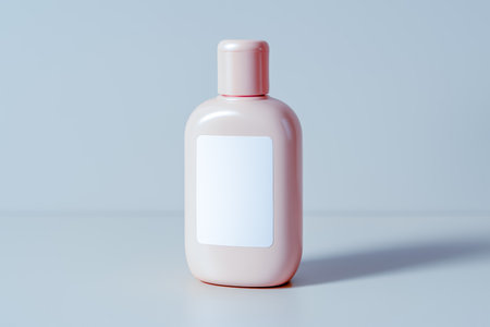 Modern minimal pastel pink cosmetic container with copy space label for branding, suitable for lotion, cream, serum, hair care, body moisturizer mockup, wellness marketing, clean product advertisementの写真素材
