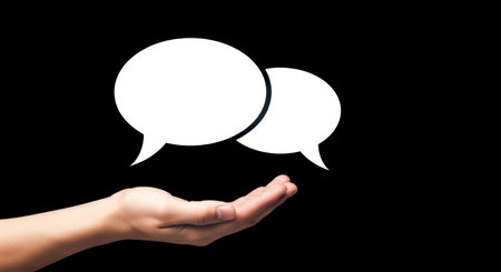 Person showing empty chat icons for social media message. Mockup for text, quote, or opinion with copy spaceの写真素材