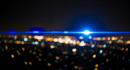 Beautiful urban bokeh texture with bright glowing streak effect, this is perfect wallpaper for amazing party or holiday celebration conceptの写真素材