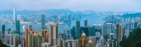 Modern city concept Hong Kong skyline panorama Victoria Harbor towering skyscrapers financial hub Asia urban landscape famous travel tourism destination viewの写真素材