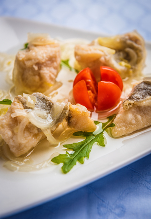White plate with sea food starter