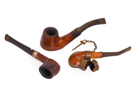 aging smoking pipe taken pictures on white backgroundの写真素材