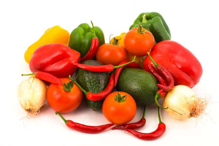 Tomatoes, onions, pepper, avocado on a white background.の写真素材
