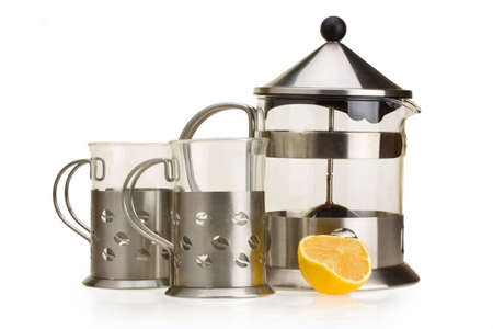 set for tea from a glass and metal on a white backgroundの写真素材