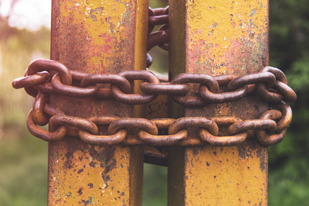 metal chain on the gate. vintage retro old concept