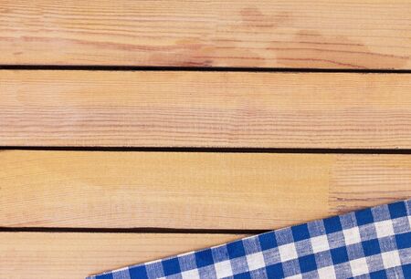 texture of blue linen cotton cloth on wooden backgroundの写真素材