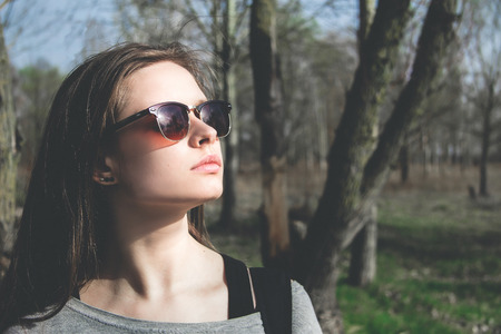 beautiful young girl in sunglassesの写真素材