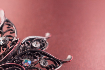 silver brooch with precious stones