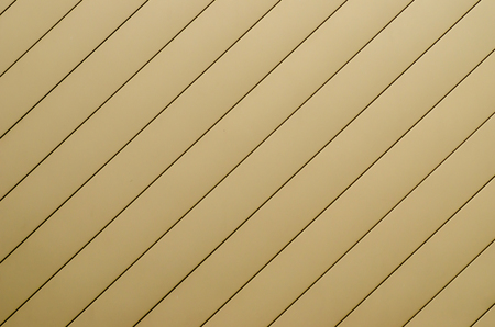 yellow corrugated wall, yellow steel background.の写真素材