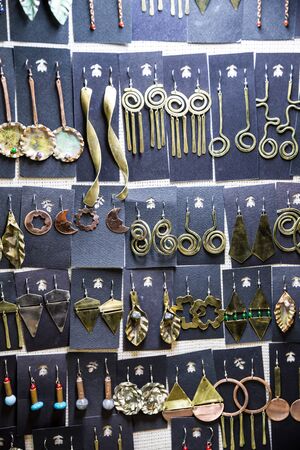 fashion accessories and leather bracelets on the shelfの写真素材