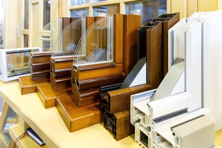 PVC window profiles stand in a row in the plastic windows shopの写真素材