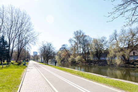 Park in the center of the city in warm sunny weather in early springの写真素材