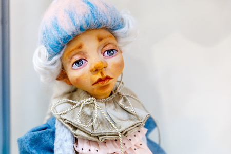 Ancient vintage beautiful dolls of bright colors on a white backgroundの写真素材