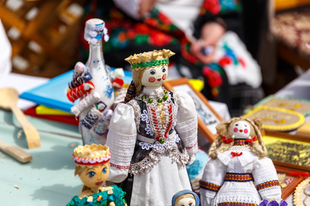 Handmade dolls made from straw at an exhibition of folk artsの写真素材