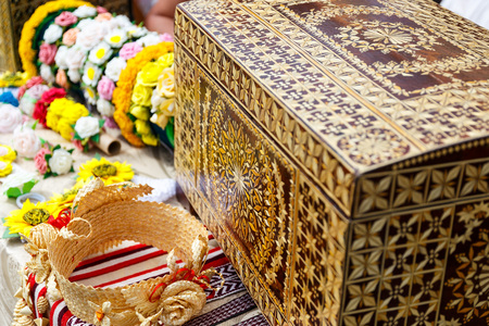 Dolls toys tableware clothes handmade souvenirs at the exhibition of folk artsの写真素材