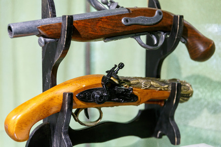 Ancient pistols and arquebus in a private collectionの写真素材