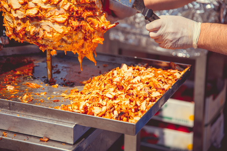 Cooking shawarma in a cafe on the streetの写真素材