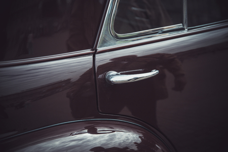 Hood and lights of the old
 Classic retro car at the exhibition of ancient carsの写真素材