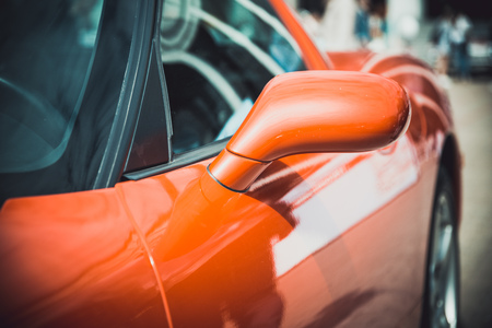 Headlights and body of an old classic car at an exhibition of vintage carsの写真素材