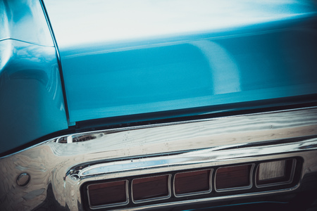 Headlights and body of an old classic car at an exhibition of vintage carsの写真素材