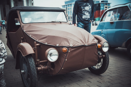 Headlights and body of an old classic car at an exhibition of vintage carsのeditorial素材