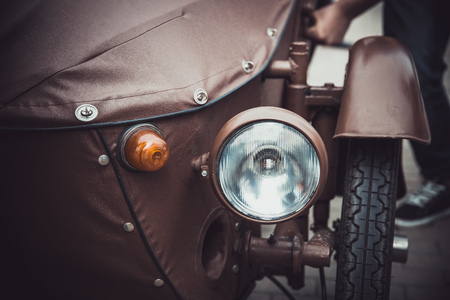 Headlights and body of an old classic car at an exhibition of vintage carsのeditorial素材