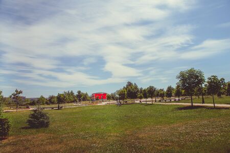 Park in the city center in sunny clear weather in summerの写真素材