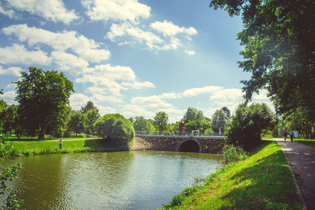 Park in the city center in bright sunny summer weatherの写真素材