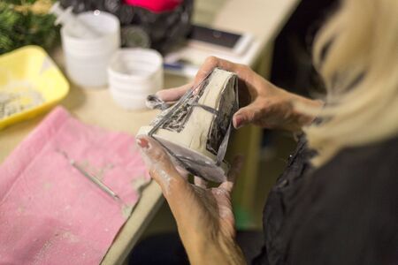 woman handicrafts New Year and Christmas tree toys for the Christmas treeの写真素材