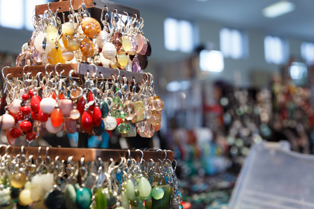 beautiful expensive jewelry, rings, amulets, necklaces, earrings in the store of elite jewelry