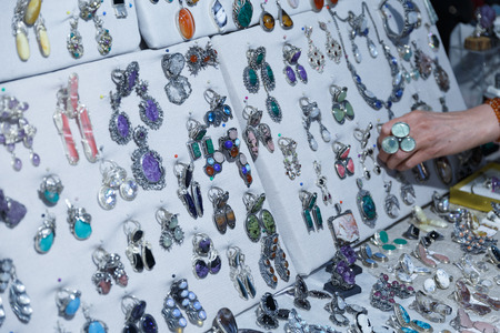 beautiful expensive jewelry, rings, amulets, necklaces, earrings in the store of elite jewelryの写真素材