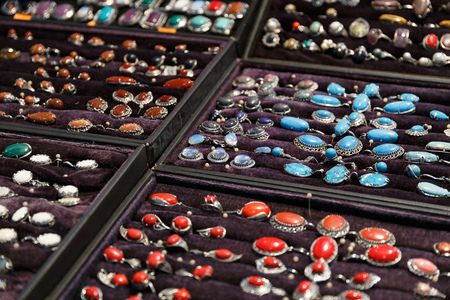 beautiful expensive jewelry, rings, amulets, necklaces, earrings in the store of elite jewelryの写真素材