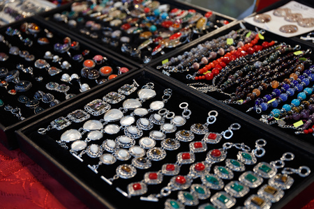 beautiful expensive jewelry, rings, amulets, necklaces, earrings in the store of elite jewelry
