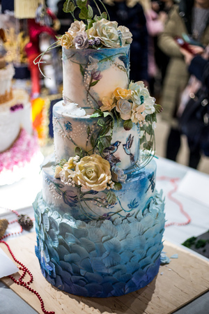 A beautiful cake in the form of a fairy-tale creature made of mastic and biscuitの写真素材