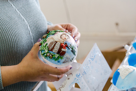 painting of Christmas balls in a factory of Christmas-tree toysの写真素材