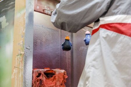 paints Christmas toys at a factory of Christmas toysの写真素材