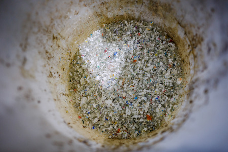 recycled plastic bottles and waste at the plantの写真素材