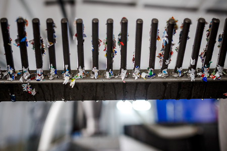 recycled plastic bottles and waste at the plantの写真素材