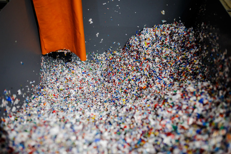 recycled plastic bottles and waste at the plantの写真素材