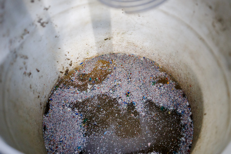 recycled plastic bottles and waste at the plantの写真素材