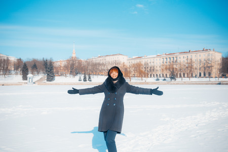 MINSK, BELARUS - February 1, 2017: Portrait of a happy beautiful girl with red hair in the field, lifestyleのeditorial素材