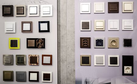 Electric light switch and socket on the empty wall