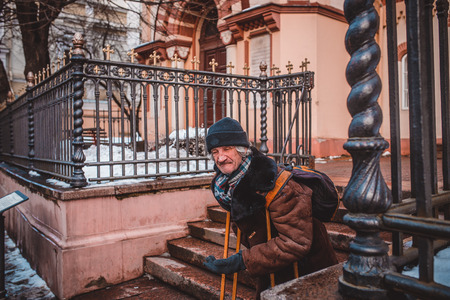 MINSK, BELARUS - MAY 1, 2017: A homeless person looking for new work. Unemployed beggars living on the street.のeditorial素材